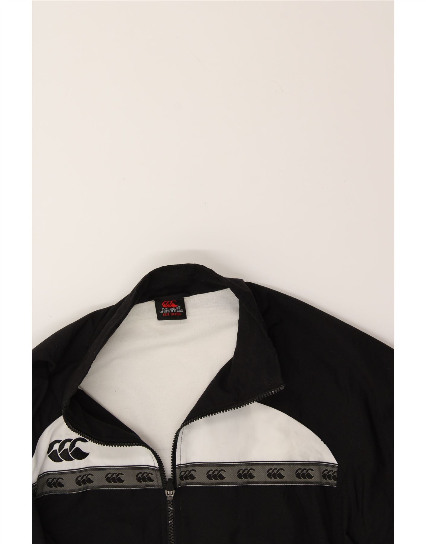 CANTERBURY Boys Graphic Tracksuit Top Jacket 13-14 Years Black Colourblock Vintage Canterbury and Second-Hand Canterbury from Messina Hembry