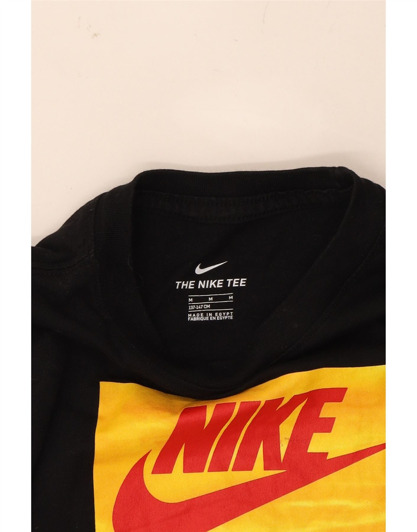 NIKE Boys Graphic T-Shirt Top 10-11 Years Medium Black Cotton Vintage Nike and Second-Hand Nike from Messina Hembry