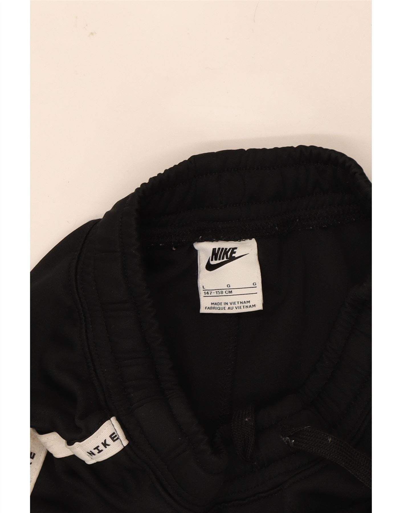 NIKE Boys Tracksuit Trousers Joggers 12-13 Years Large Black Cotton Vintage Nike and Second-Hand Nike from Messina Hembry