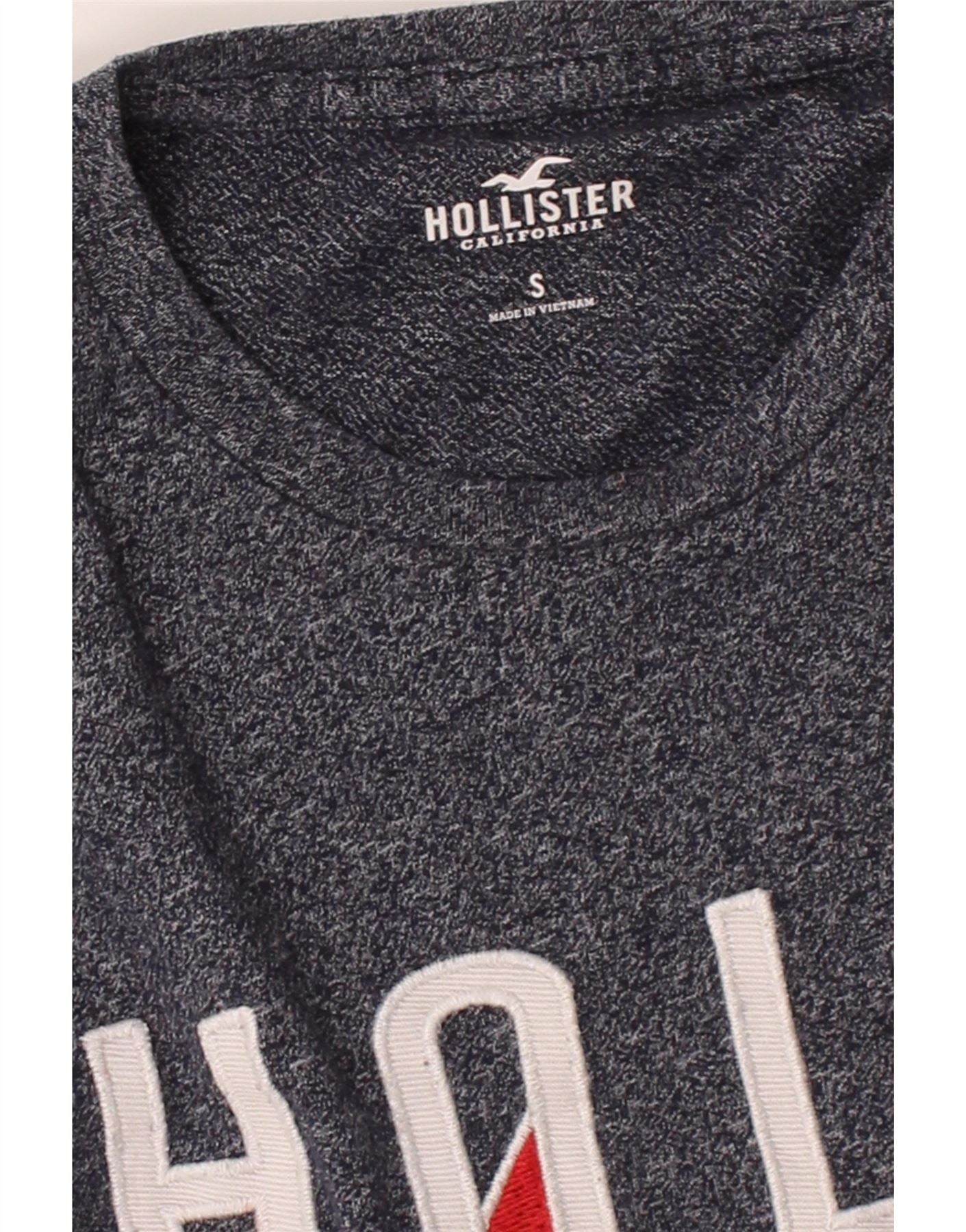 HOLLISTER Mens Graphic Top Long Sleeve Small Navy Blue Flecked Cotton Vintage Hollister and Second-Hand Hollister from Messina Hembry
