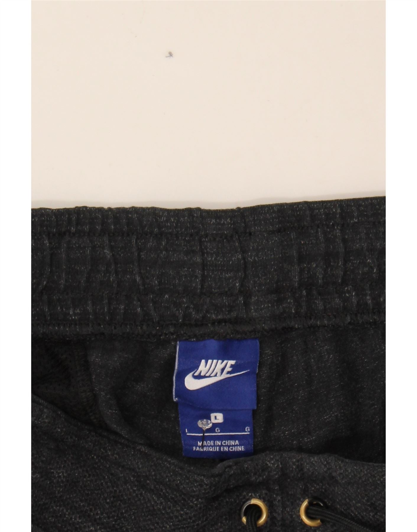 NIKE Mens Tracksuit Trousers Joggers Large  Black Polyester Vintage Nike and Second-Hand Nike from Messina Hembry
