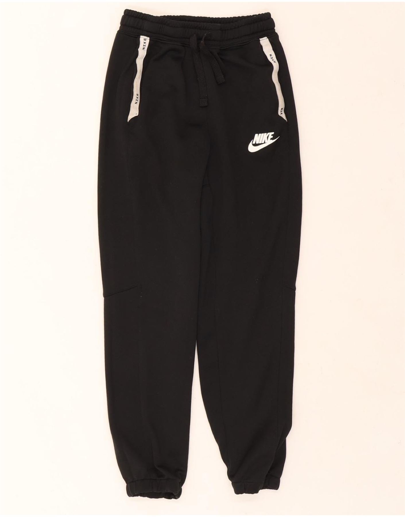 NIKE Boys Tracksuit Trousers Joggers 12-13 Years Large Black Cotton Vintage Nike and Second-Hand Nike from Messina Hembry
