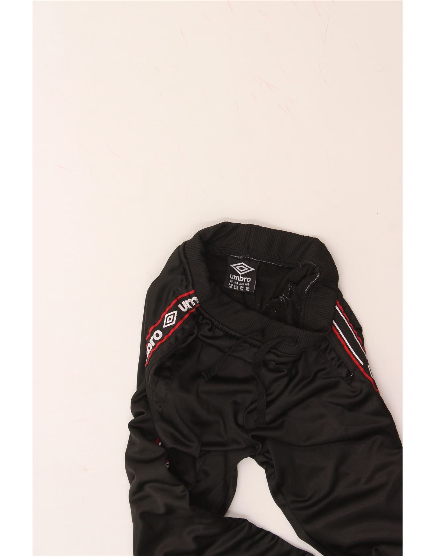 UMBRO Boys Graphic Tracksuit Trousers Joggers 9-10 Years Black Polyester Vintage Umbro and Second-Hand Umbro from Messina Hembry