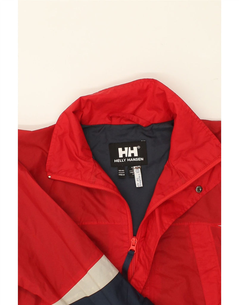 HELLY HANSEN Boys Graphic Rain Jacket 9-10 Years Red Colourblock Nylon | Vintage Helly Hansen | Thrift | Second-Hand Helly Hansen | Used Clothing | Messina Hembry 