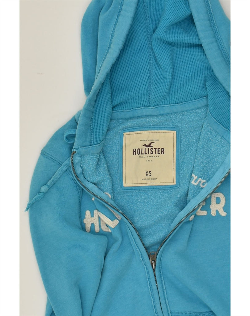 HOLLISTER Womens Graphic Zip Hoodie Sweater UK 6 XS Blue Cotton | Vintage Hollister | Thrift | Second-Hand Hollister | Used Clothing | Messina Hembry 