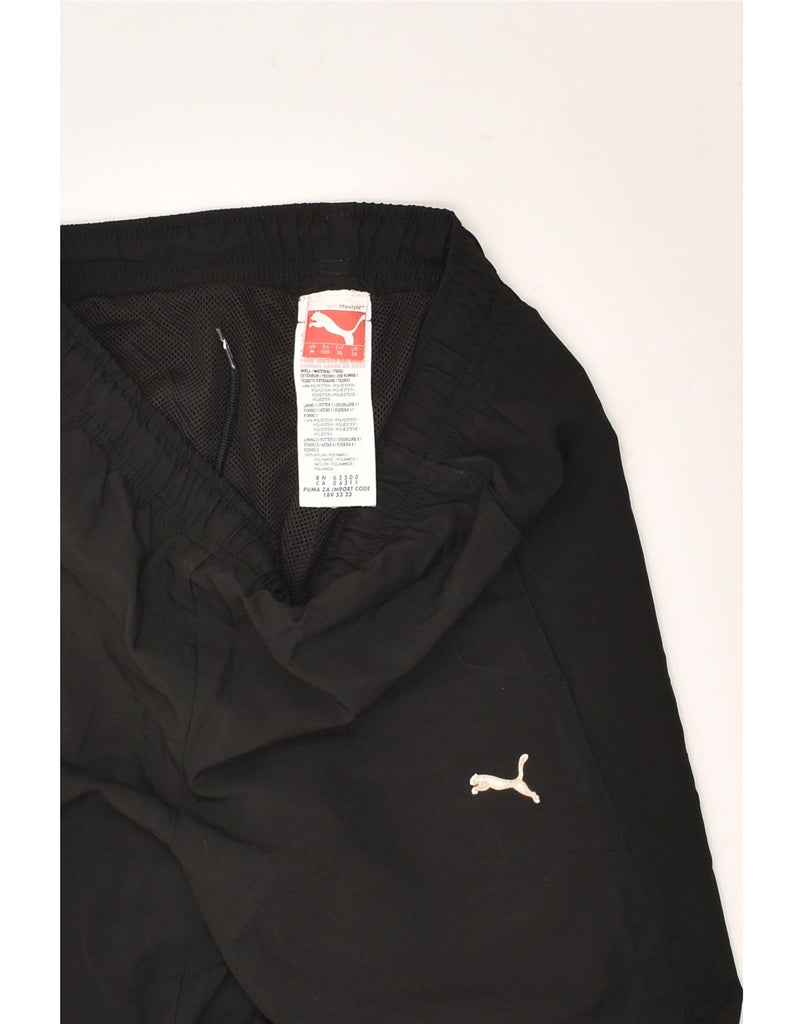 PUMA Boys Graphic Tracksuit Trousers Joggers 9-10 Years Black Polyester | Vintage Puma | Thrift | Second-Hand Puma | Used Clothing | Messina Hembry 