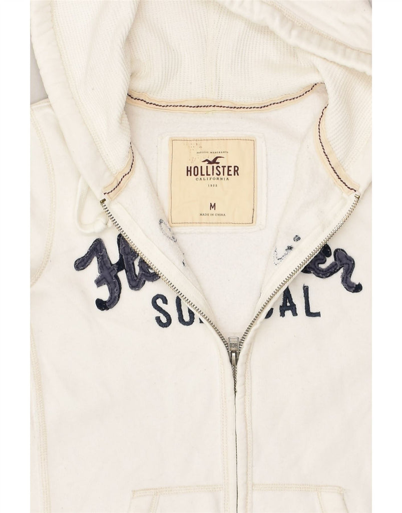 HOLLISTER Womens Graphic Zip Hoodie Sweater UK 12 Medium White Cotton | Vintage Hollister | Thrift | Second-Hand Hollister | Used Clothing | Messina Hembry 