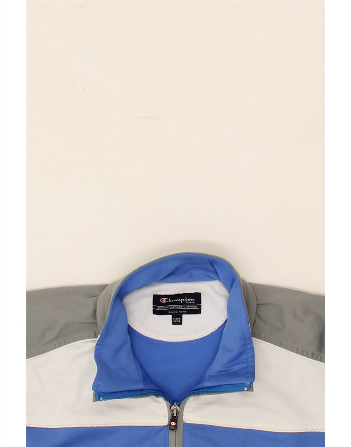 CHAMPION Boys Graphic Tracksuit Top Jacket 11-12 Years Blue Colourblock Vintage Champion and Second-Hand Champion from Messina Hembry 