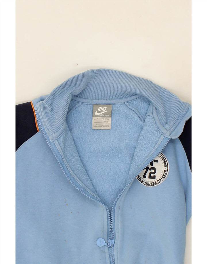 NIKE Boys Graphic Tracksuit Top Jacket 6-7 Years Large Blue Colourblock Vintage Nike and Second-Hand Nike from Messina Hembry 