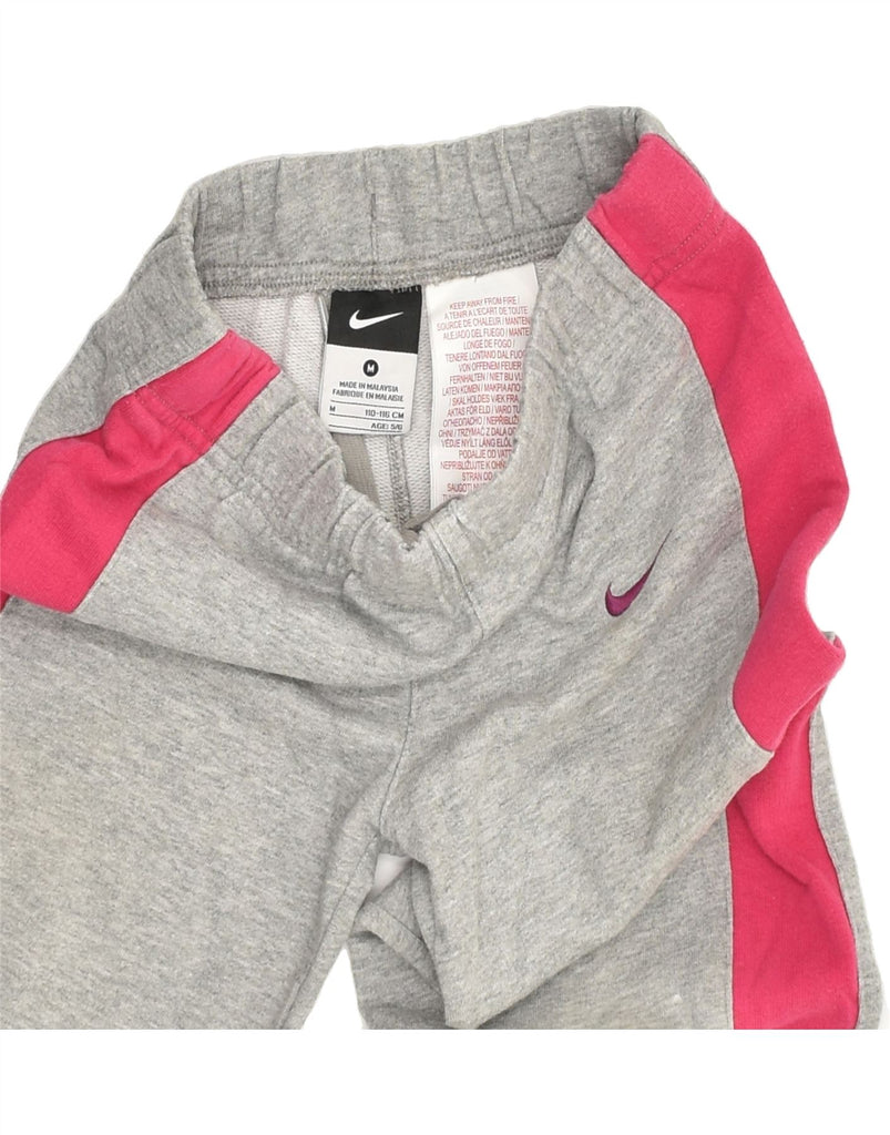 NIKE Girls Tracksuit Trousers 5-6 Years Medium Grey Colourblock Cotton | Vintage Nike | Thrift | Second-Hand Nike | Used Clothing | Messina Hembry 