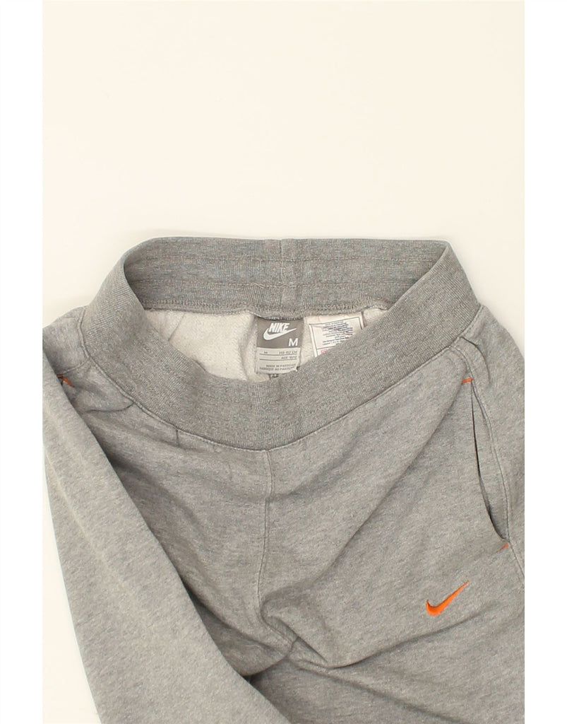 NIKE Boys Graphic Tracksuit Trousers 10-11 Years Medium Grey Cotton | Vintage Nike | Thrift | Second-Hand Nike | Used Clothing | Messina Hembry 