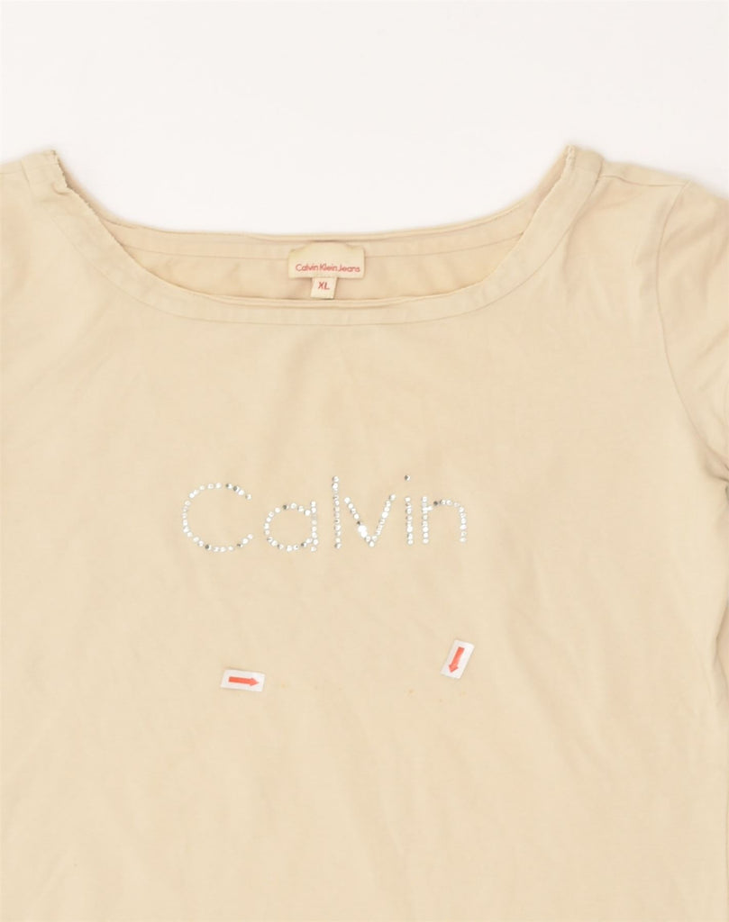 CALVIN KLEIN Girls Graphic T-Shirt Top 14-15 Years XL  Beige Cotton | Vintage Calvin Klein | Thrift | Second-Hand Calvin Klein | Used Clothing | Messina Hembry 