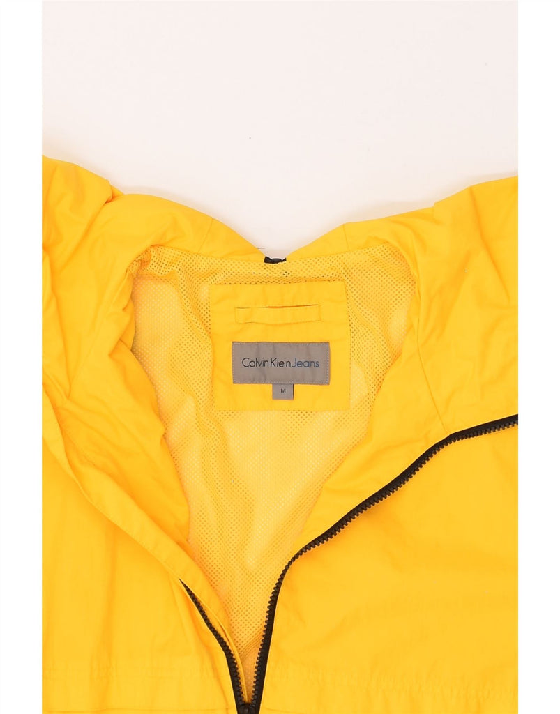 CALVIN KLEIN Womens Loose Fit Rain Jacket UK 14 Medium Yellow Polyamide | Vintage Calvin Klein | Thrift | Second-Hand Calvin Klein | Used Clothing | Messina Hembry 