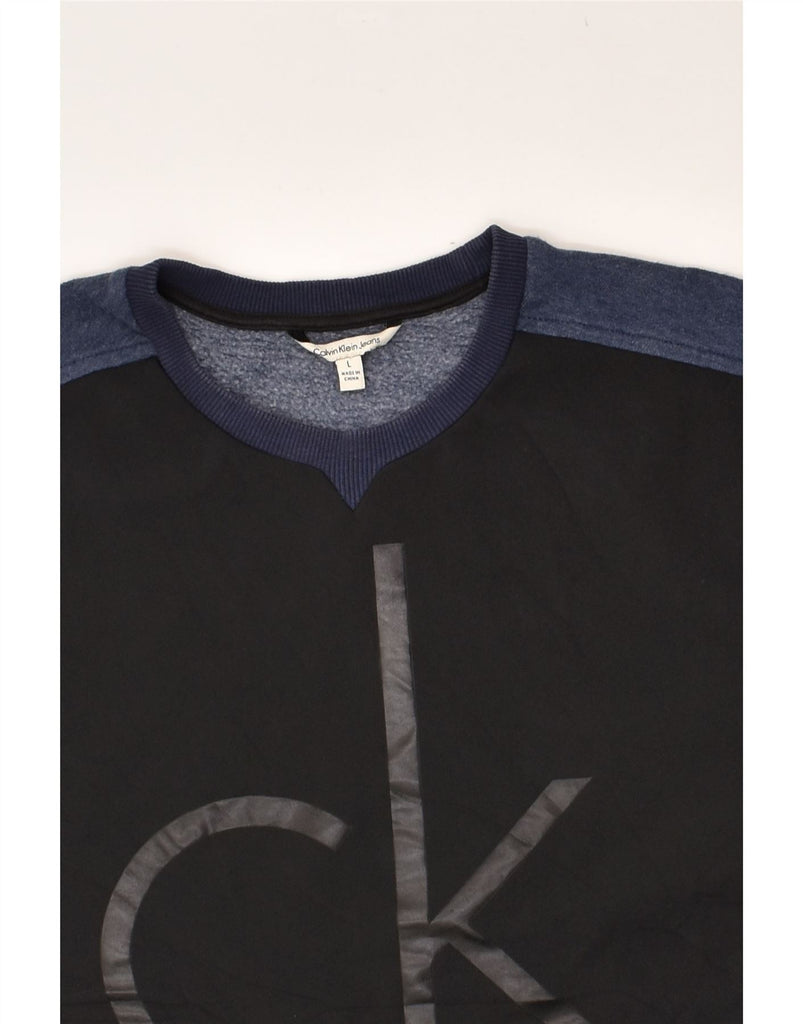 CALVIN KLEIN Womens Graphic Sweatshirt Jumper UK 16 Large Navy Blue | Vintage Calvin Klein | Thrift | Second-Hand Calvin Klein | Used Clothing | Messina Hembry 