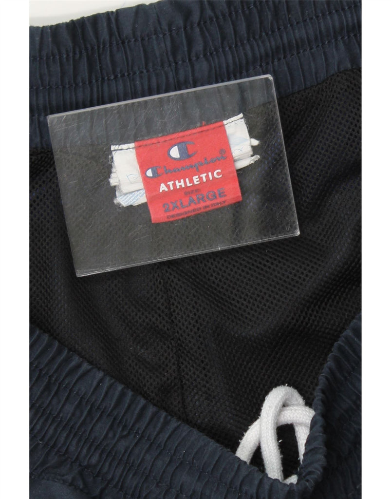 CHAMPION Mens Tracksuit Trousers 2XL Navy Blue Colourblock Polyester Vintage Champion and Second-Hand Champion from Messina Hembry 