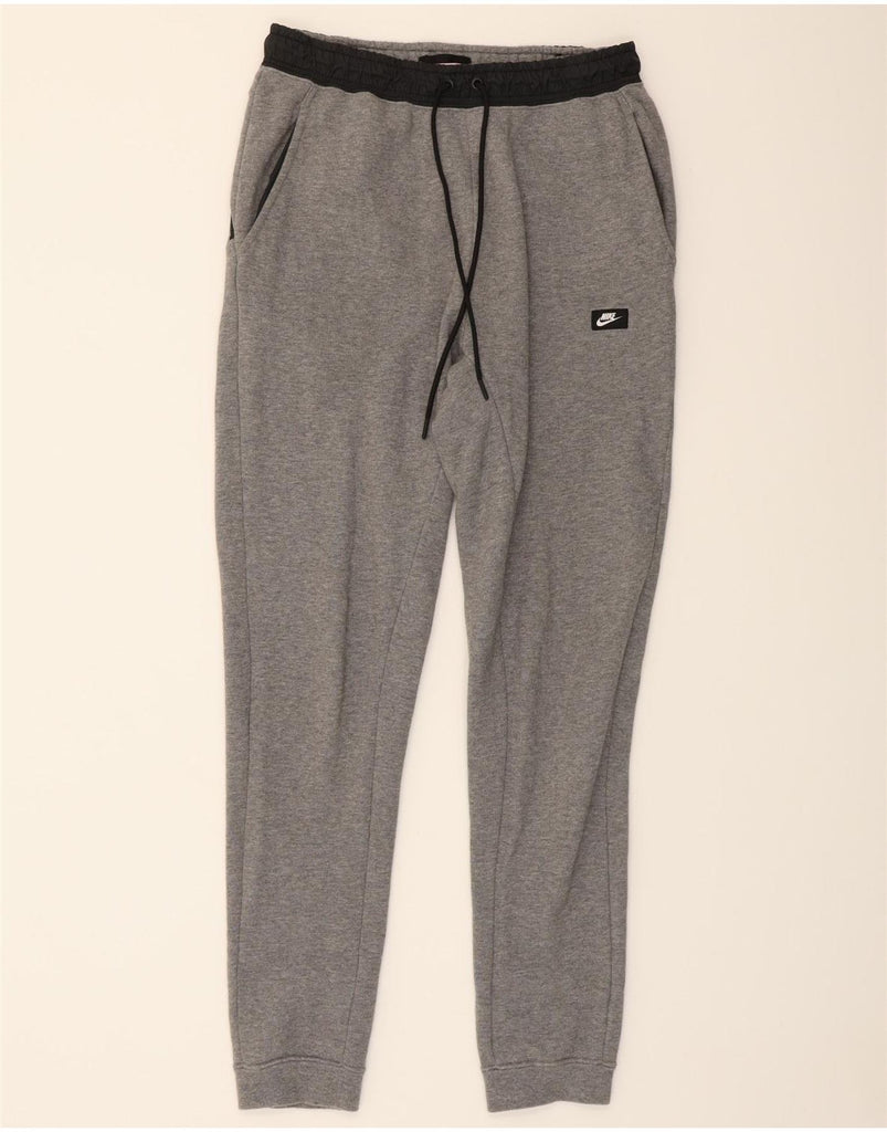 NIKE Mens Tracksuit Trousers Joggers Medium  Grey Cotton Vintage Nike and Second-Hand Nike from Messina Hembry 