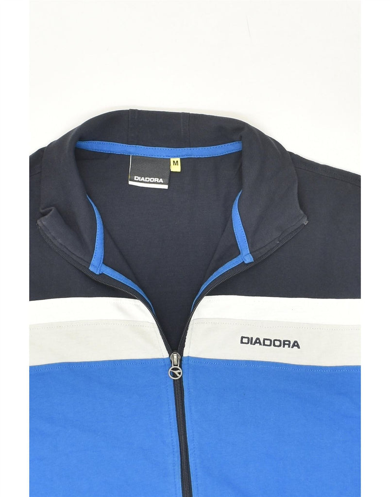 DIADORA Mens Tracksuit Top Jacket Medium Navy Blue Colourblock Cotton Vintage Diadora and Second-Hand Diadora from Messina Hembry 