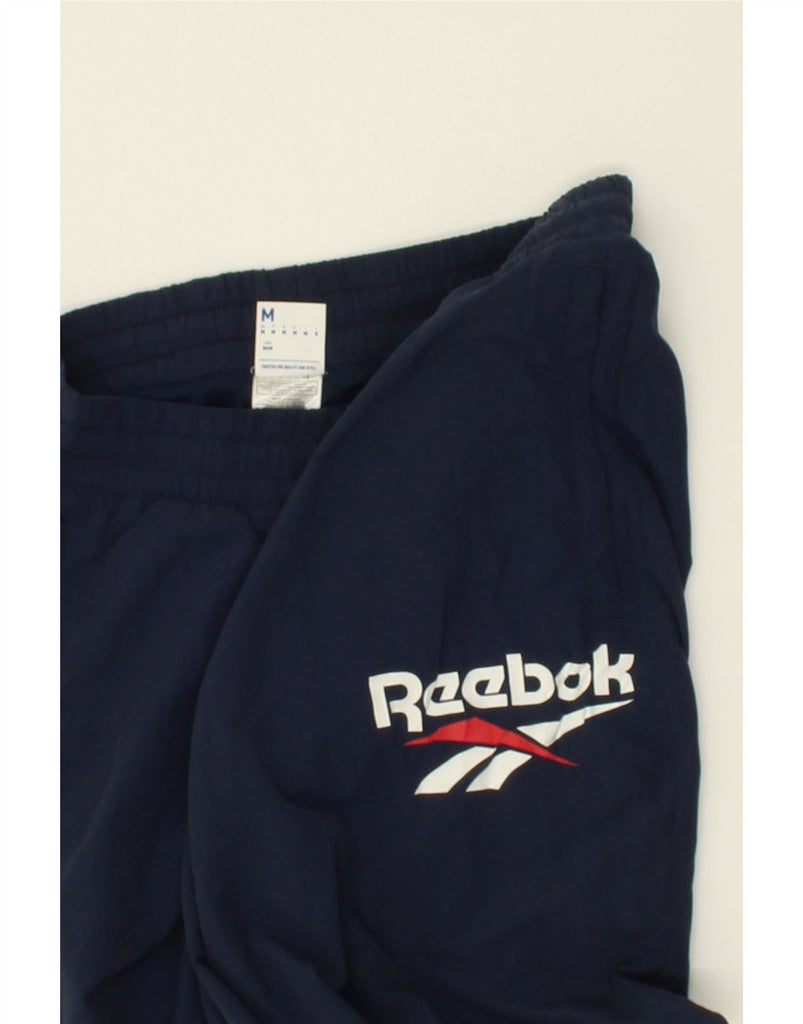 REEBOK Mens Graphic Tracksuit Trousers Joggers Medium Navy Blue Nylon | Vintage Reebok | Thrift | Second-Hand Reebok | Used Clothing | Messina Hembry 