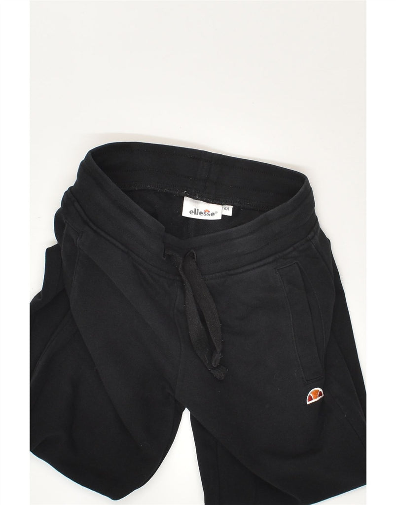 ELLESSE Boys Graphic Tracksuit Trousers Joggers 5-6 Years Black Cotton | Vintage Ellesse | Thrift | Second-Hand Ellesse | Used Clothing | Messina Hembry 