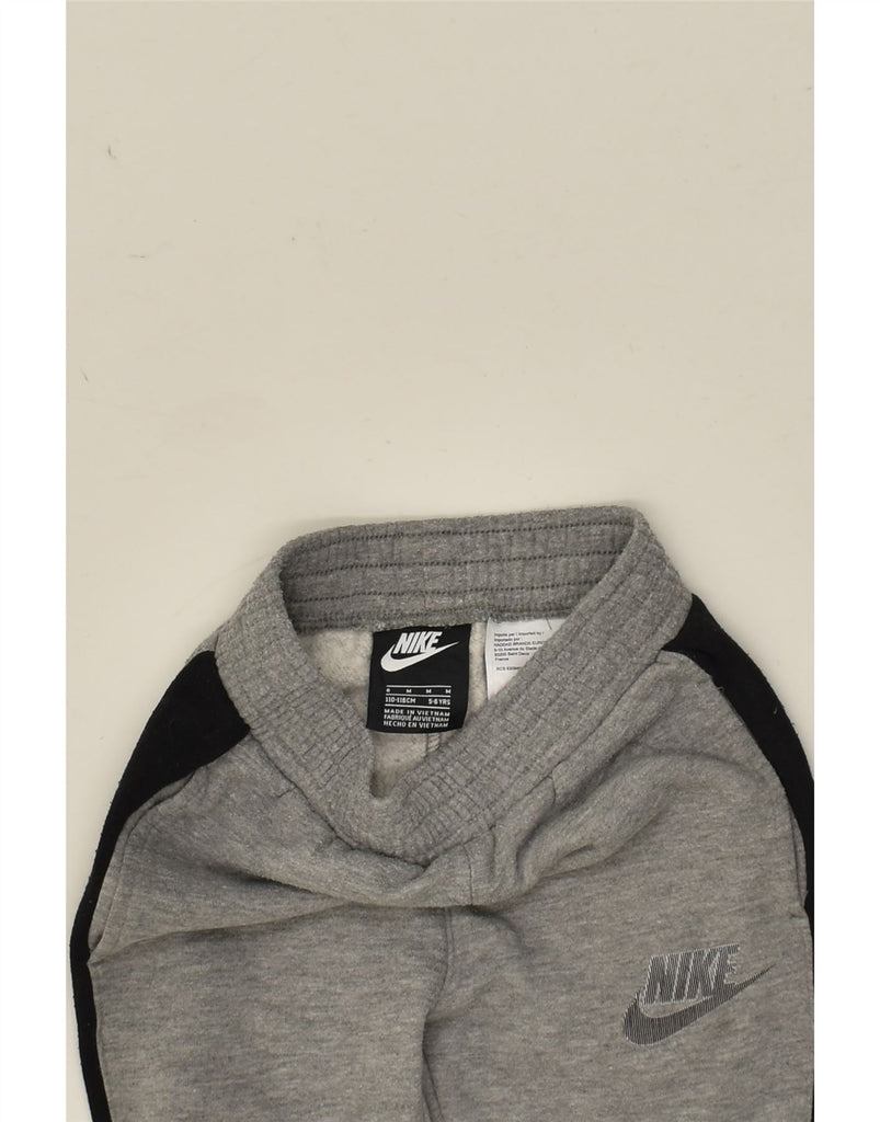 NIKE Boys Tracksuit Trousers Joggers 5-6 Years Medium Grey Colourblock | Vintage Nike | Thrift | Second-Hand Nike | Used Clothing | Messina Hembry 