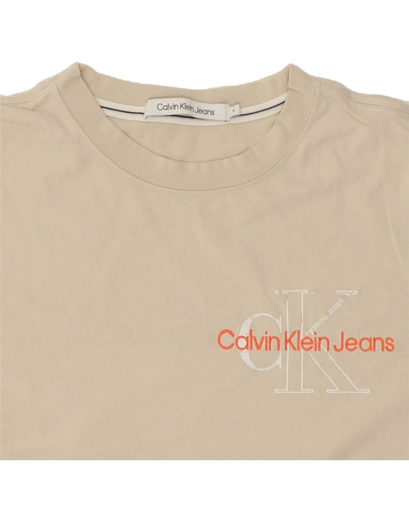 CALVIN KLEIN JEANS Mens Graphic T-Shirt Top Medium Beige Cotton | Vintage Calvin Klein Jeans | Thrift | Second-Hand Calvin Klein Jeans | Used Clothing | Messina Hembry 