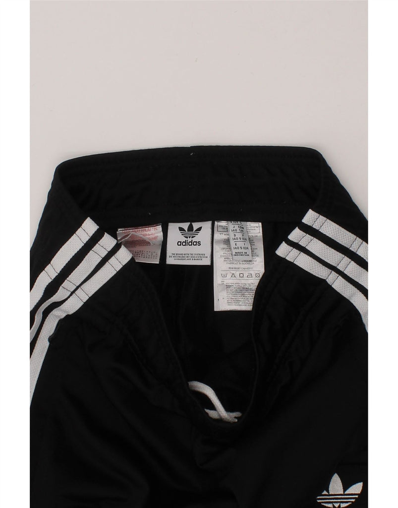 ADIDAS Boys Tracksuit Trousers Joggers 9-10 Years  Black Polyester Vintage Adidas and Second-Hand Adidas from Messina Hembry 