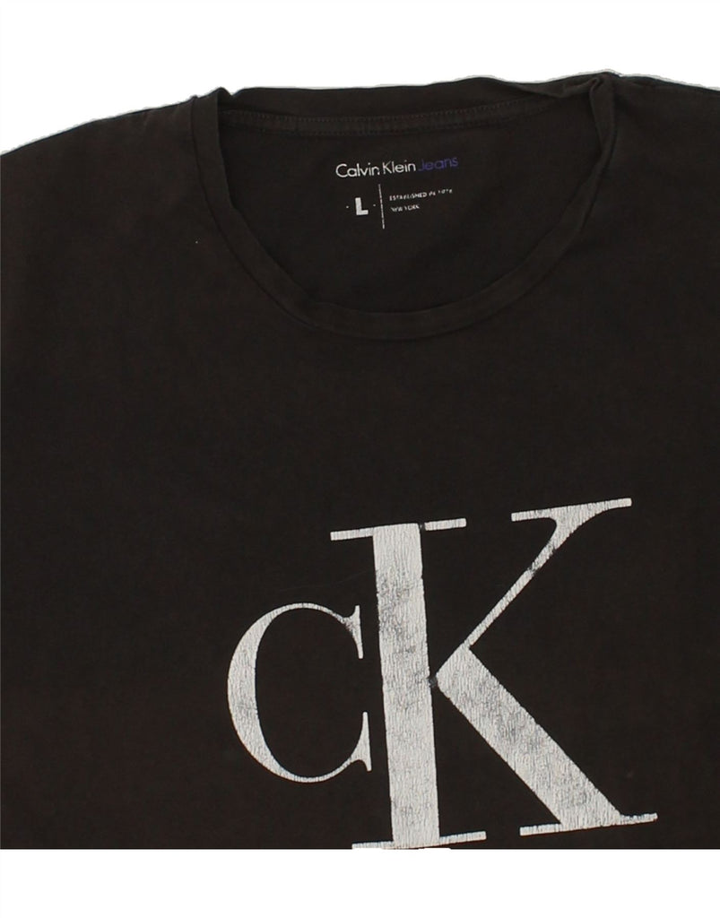 CALVIN KLEIN JEANS Mens Graphic T-Shirt Top Large Black Colourblock | Vintage Calvin Klein Jeans | Thrift | Second-Hand Calvin Klein Jeans | Used Clothing | Messina Hembry 