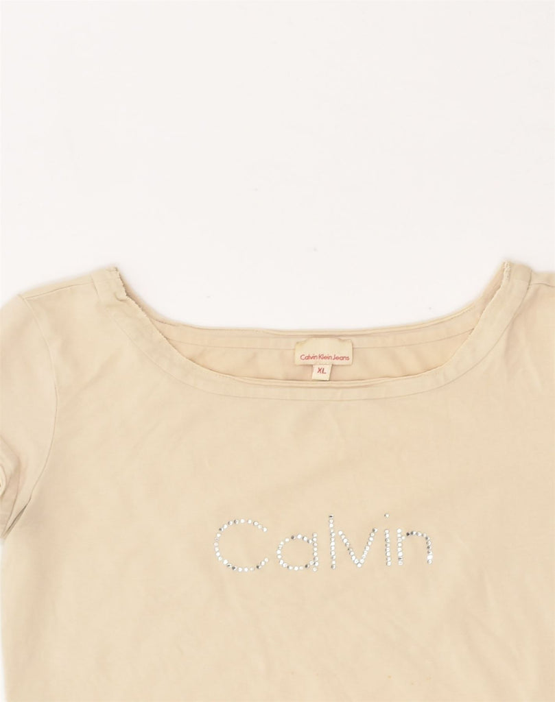 CALVIN KLEIN Girls Graphic T-Shirt Top 14-15 Years XL  Beige Cotton | Vintage Calvin Klein | Thrift | Second-Hand Calvin Klein | Used Clothing | Messina Hembry 