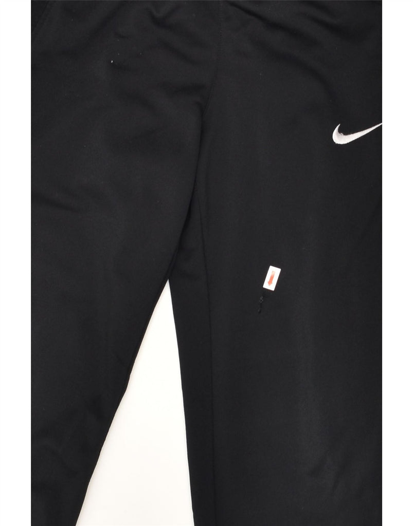 NIKE Boys Tracksuit Trousers 8-9 Years Small Black Polyester | Vintage Nike | Thrift | Second-Hand Nike | Used Clothing | Messina Hembry 