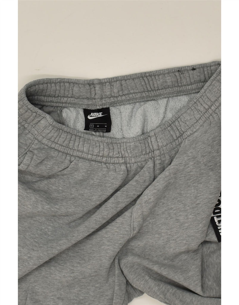 NIKE Mens Tracksuit Trousers Joggers Medium Grey Cotton | Vintage Nike | Thrift | Second-Hand Nike | Used Clothing | Messina Hembry 