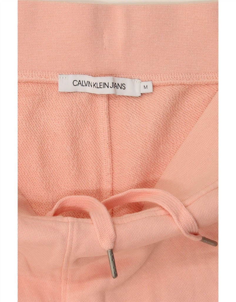 CALVIN KLEIN Womens Graphic Tracksuit Trousers Joggers UK 14 Medium  Pink Vintage Calvin Klein and Second-Hand Calvin Klein from Messina Hembry 