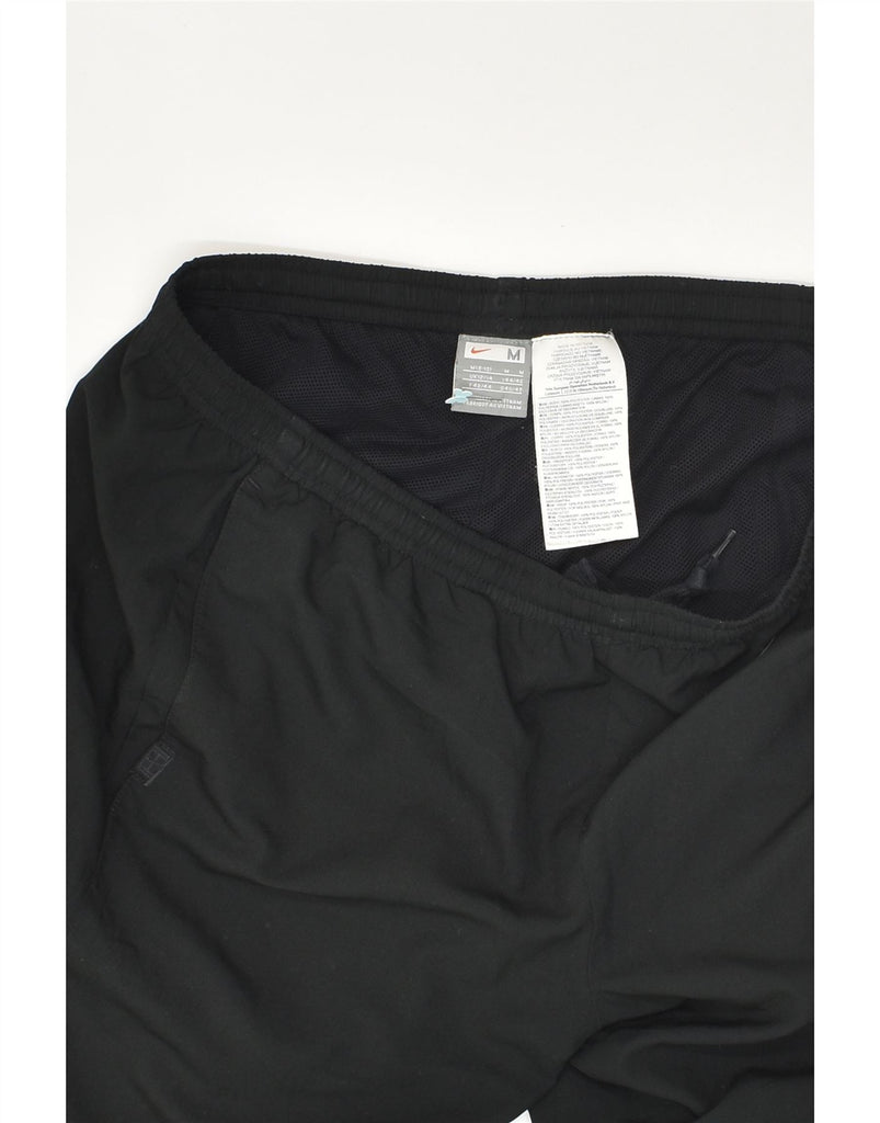 NIKE Womens Tracksuit Trousers UK 12 Medium Black Polyester | Vintage Nike | Thrift | Second-Hand Nike | Used Clothing | Messina Hembry 