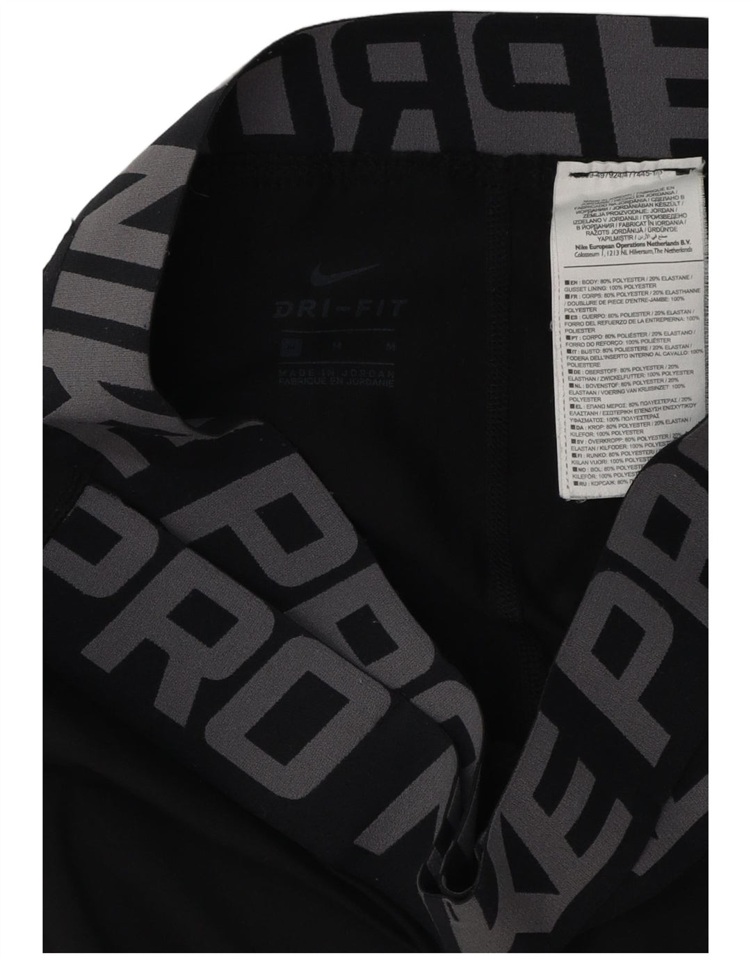 NIKE Womens Dri Fit Graphic Leggings UK 12 Medium  Black Polyester