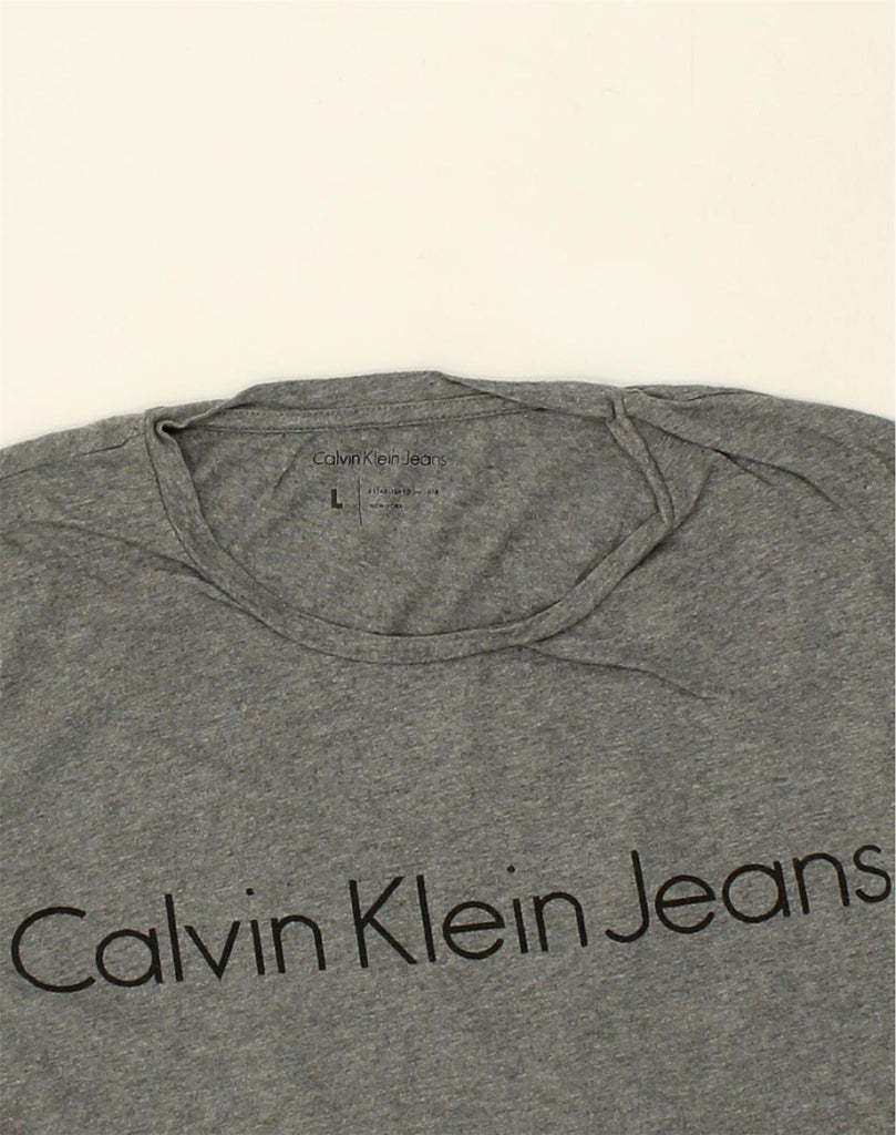 CALVIN KLEIN Mens Graphic Top Long Sleeve Large Grey Cotton | Vintage Calvin Klein | Thrift | Second-Hand Calvin Klein | Used Clothing | Messina Hembry 