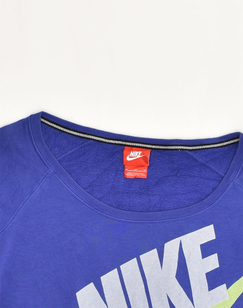 NIKE Womens Short Sleeve Graphic Sweatshirt Jumper UK 14 Medium Blue | Vintage Nike | Thrift | Second-Hand Nike | Used Clothing | Messina Hembry 