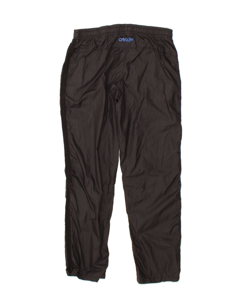 OAKLEY Womens Tracksuit Trousers UK 14 Large Black Polyester Vintage Oakley and Second-Hand Oakley from Messina Hembry 
