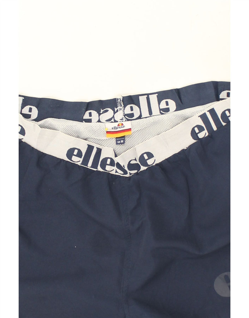 ELLESSE Womens Graphic Sport Shorts UK 14 Medium Navy Blue Polyester | Vintage Ellesse | Thrift | Second-Hand Ellesse | Used Clothing | Messina Hembry 