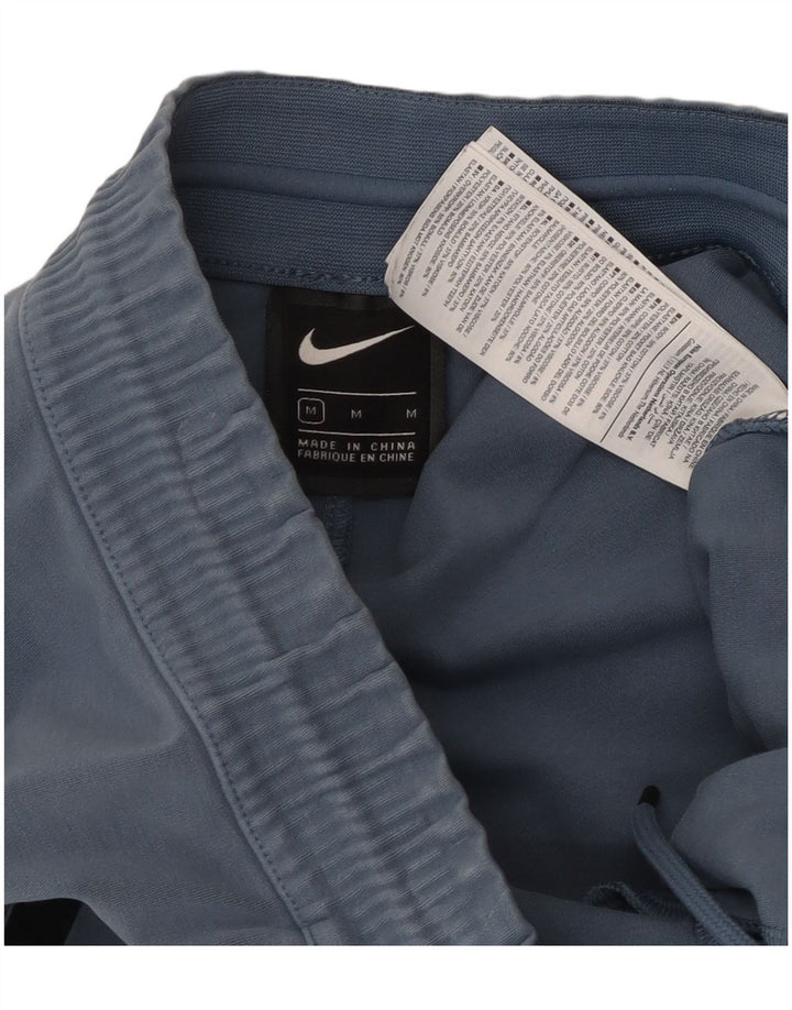 NIKE Mens Tracksuit Trousers Medium  Blue Colourblock Cotton