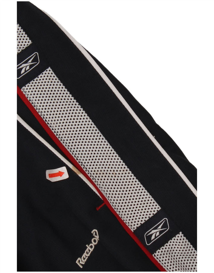 Reebok Boys Graphic Tracksuit Trousers 14-15 Years XL Navy Blue Colourblock