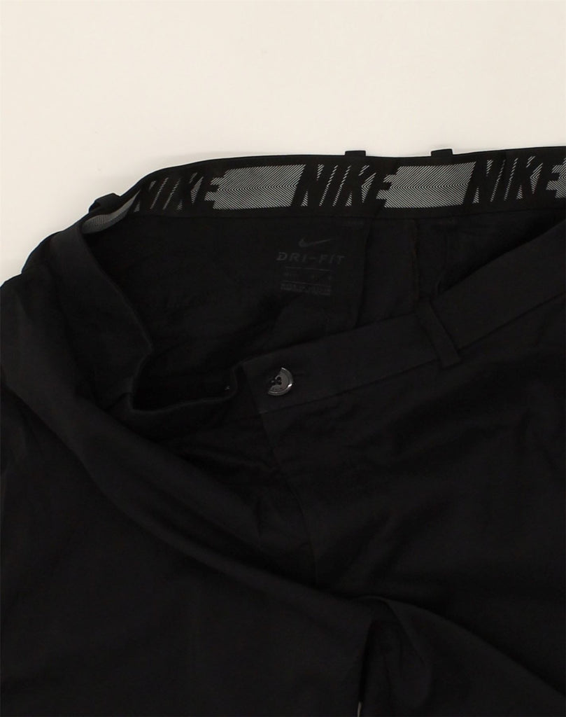 NIKE Womens Dri Fit Slim Casual Trousers W33 L30 Black Polyester | Vintage Nike | Thrift | Second-Hand Nike | Used Clothing | Messina Hembry 