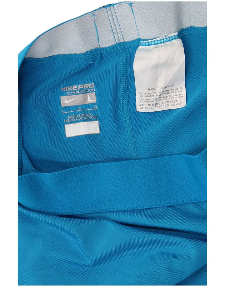 NIKE Womens Dri Fit Capri Leggings UK 14 Large  Blue Polyester