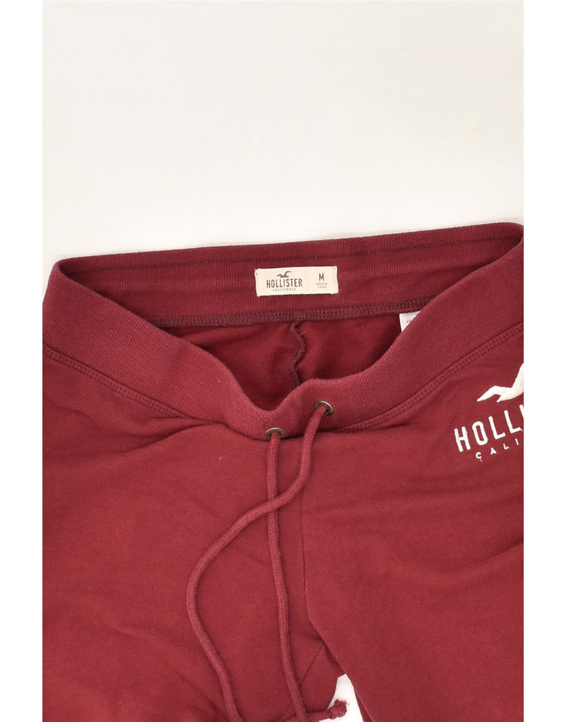 HOLLISTER Womens Graphic Tracksuit Trousers Joggers UK 12 Medium Maroon | Vintage Hollister | Thrift | Second-Hand Hollister | Used Clothing | Messina Hembry 