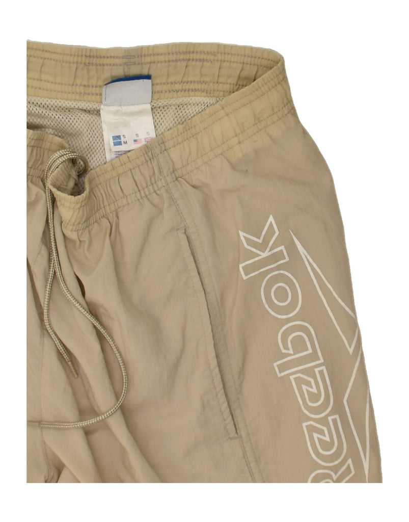 REEBOK Mens Graphic Sport Shorts Small  Beige Nylon | Vintage Reebok | Thrift | Second-Hand Reebok | Used Clothing | Messina Hembry 