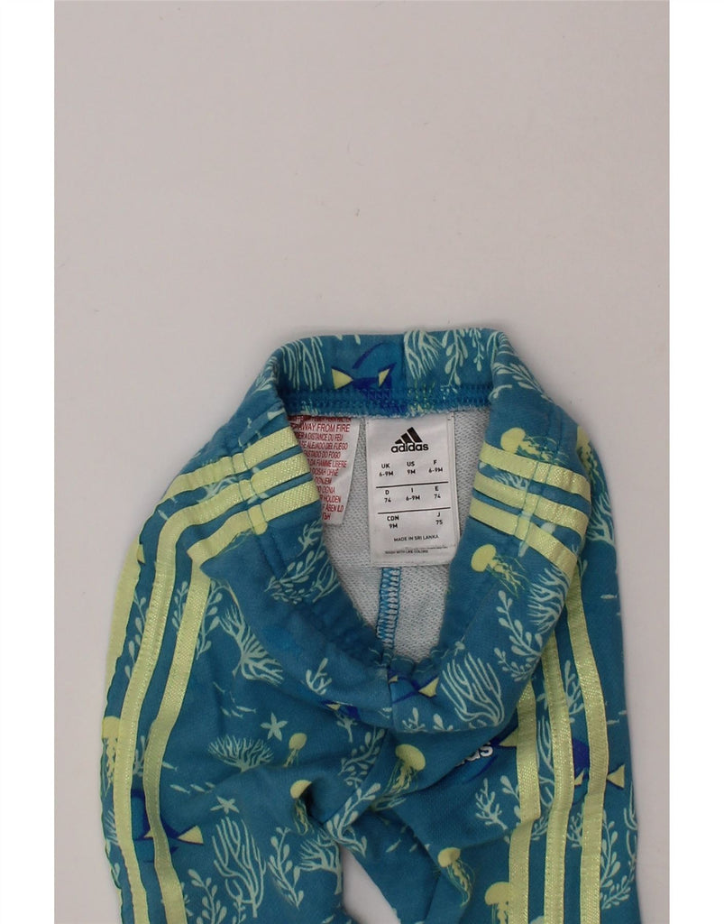 ADIDAS Baby Girls Graphic Joggers Tracksuit Trousers 6-9 Months  Blue Vintage Adidas and Second-Hand Adidas from Messina Hembry 
