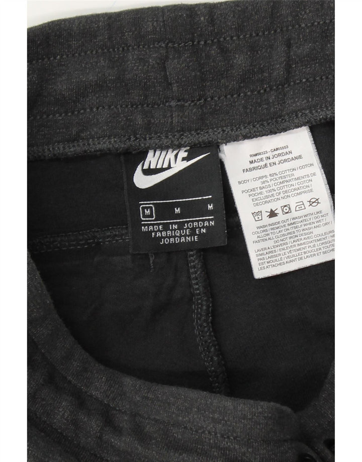 NIKE Mens Tracksuit Trousers Joggers Medium Grey Cotton Vintage Nike and Second-Hand Nike from Messina Hembry 