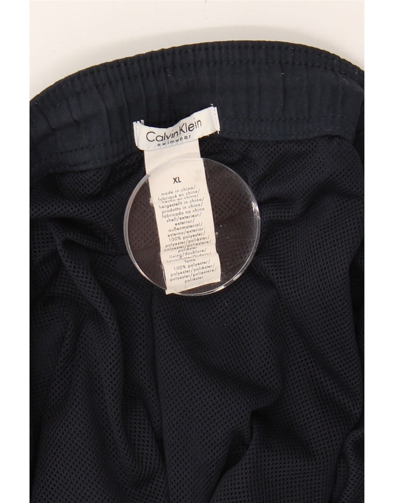 CALVIN KLEIN Mens Graphic Swimming Shorts XL  Navy Blue Polyester Vintage Calvin Klein and Second-Hand Calvin Klein from Messina Hembry 