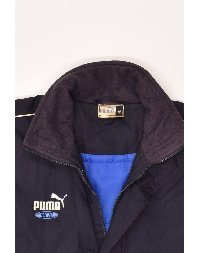 PUMA Mens Loose Fit Windbreaker Jacket UK 38 Medium Navy Blue Polyester | Vintage Puma | Thrift | Second-Hand Puma | Used Clothing | Messina Hembry 