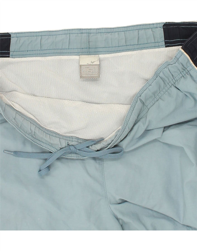 NIKE Mens Sport Shorts Large Blue Colourblock Polyester | Vintage Nike | Thrift | Second-Hand Nike | Used Clothing | Messina Hembry 