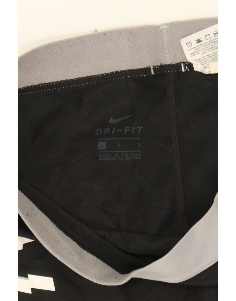 NIKE Womens Dri Fit Graphic Capri Leggings UK 16 Large  Black Polyester Vintage Nike and Second-Hand Nike from Messina Hembry 