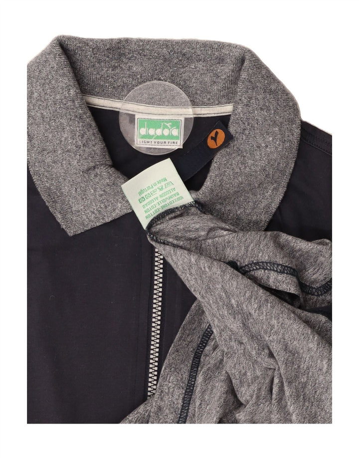 DIADORA Mens Polo Shirt IT 48 Medium Navy Blue Colourblock Cotton Vintage Diadora and Second-Hand Diadora from Messina Hembry 